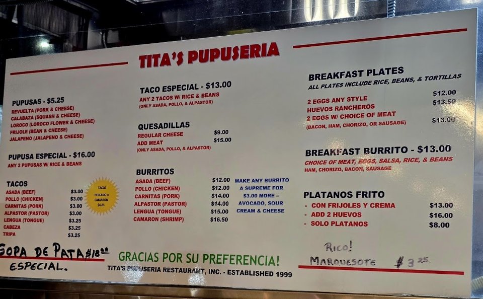 Printed menu for pupusas, tacos, and fajitas.